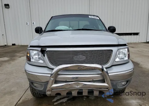 2000 Ford F150 из США, поврежденный, VIN 1FTRX18LXYNA70966